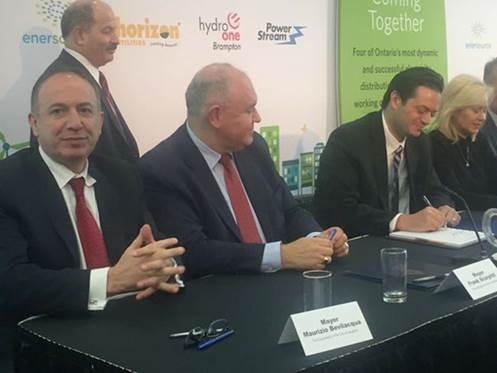 Various officials were on hand Thursday in Hamilton to sign a new PowerStream deal. Among them was Barrie Mayor Jeff Lehman. PowerStream Twitter photo