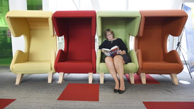 Vaughan Public Libraries CEO Margie Singleton sits in one of the new branch’s comfortable, private reading chairs. (Fred Lum/The Globe and Mail)